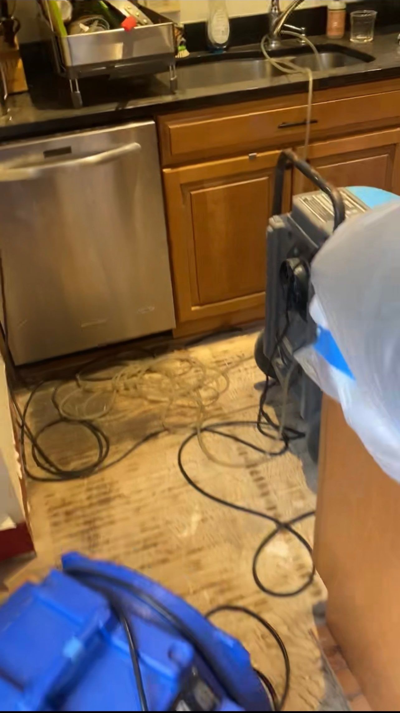 Ceiling damage assessment and preparation for repair following water extraction phase.