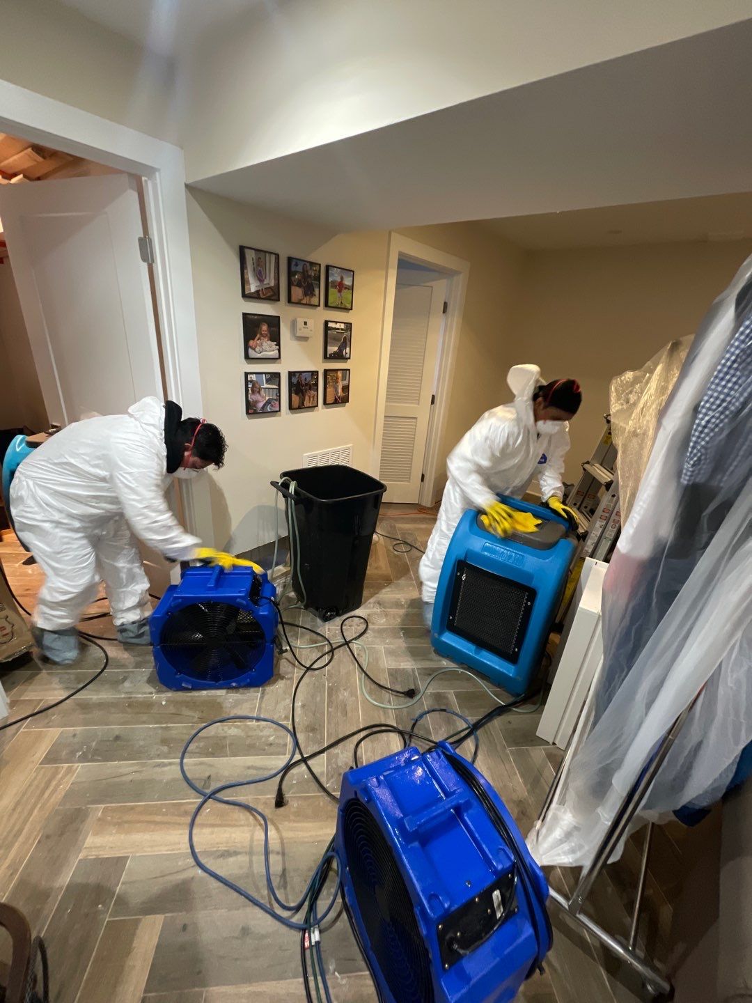 Structural drying equipment positioned throughout affected area in Washington restoration work.