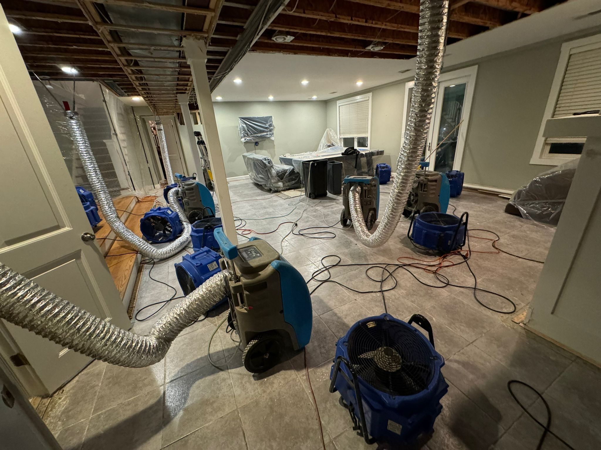 Final-stage inspection confirming water damage restoration completion in Potomac home.