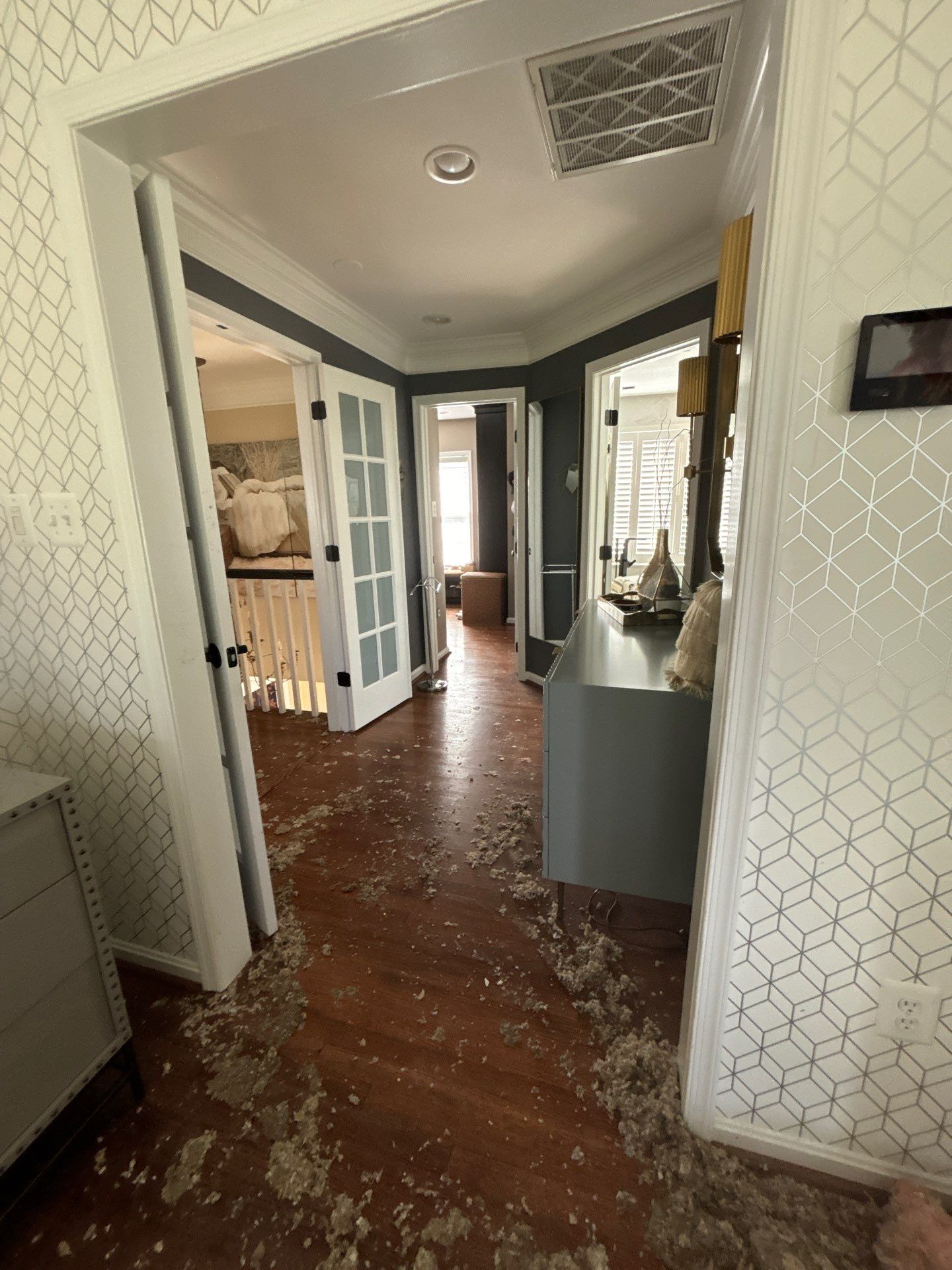 Standing water extraction underway during water damage restoration in Washington, removing pooled moisture from affected interior space.