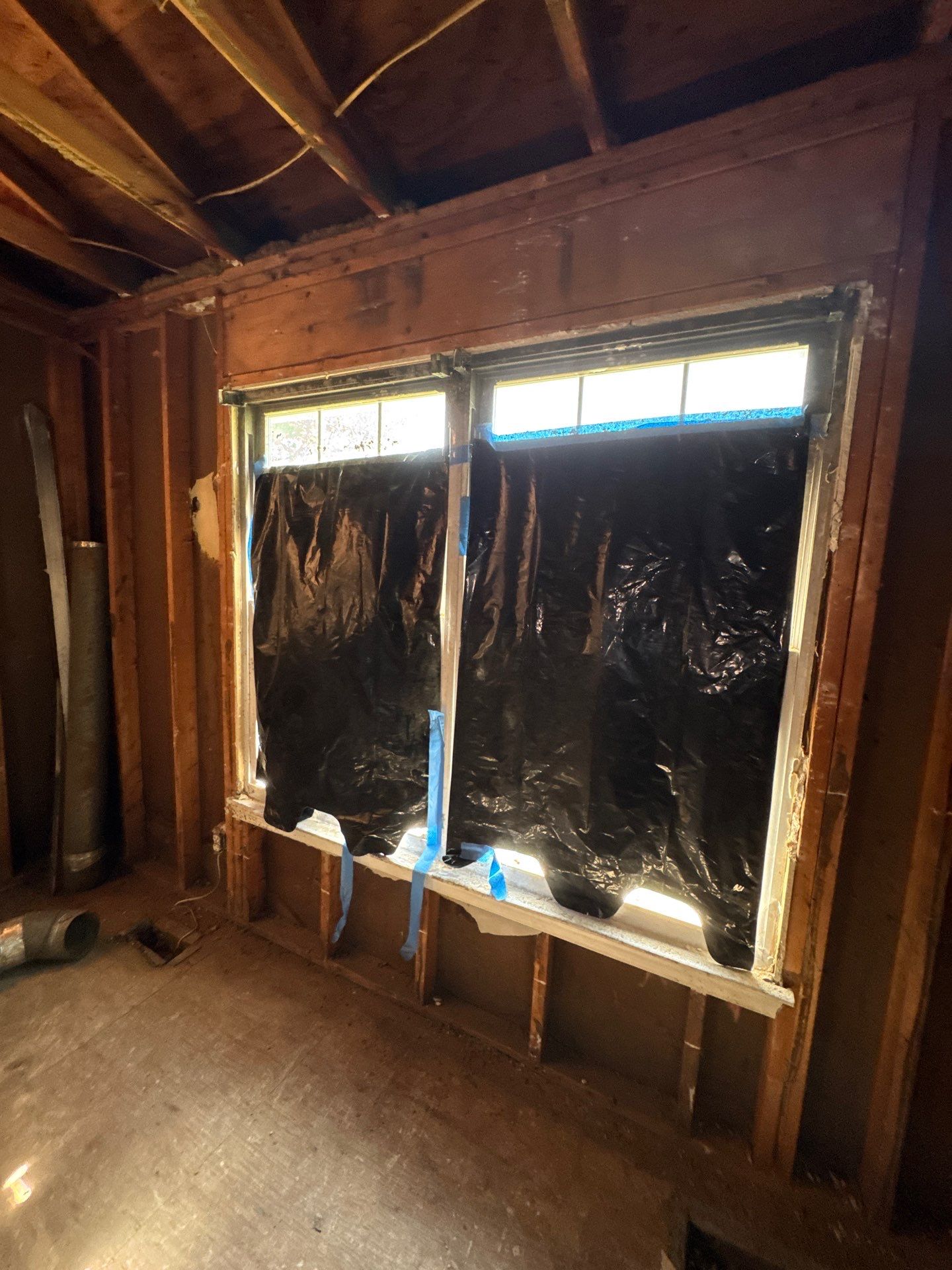 Continued ceiling restoration showing structural cleaning and preparation for final treatment phases.