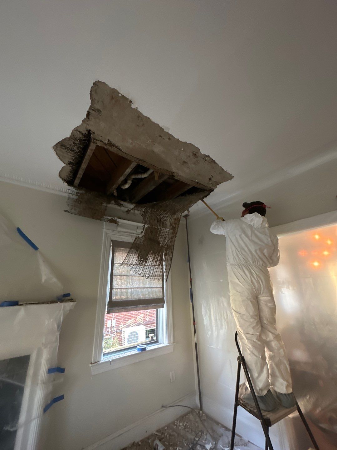 Sanitizing application completing Washington water damage restoration, structural surfaces prepared for occupancy.