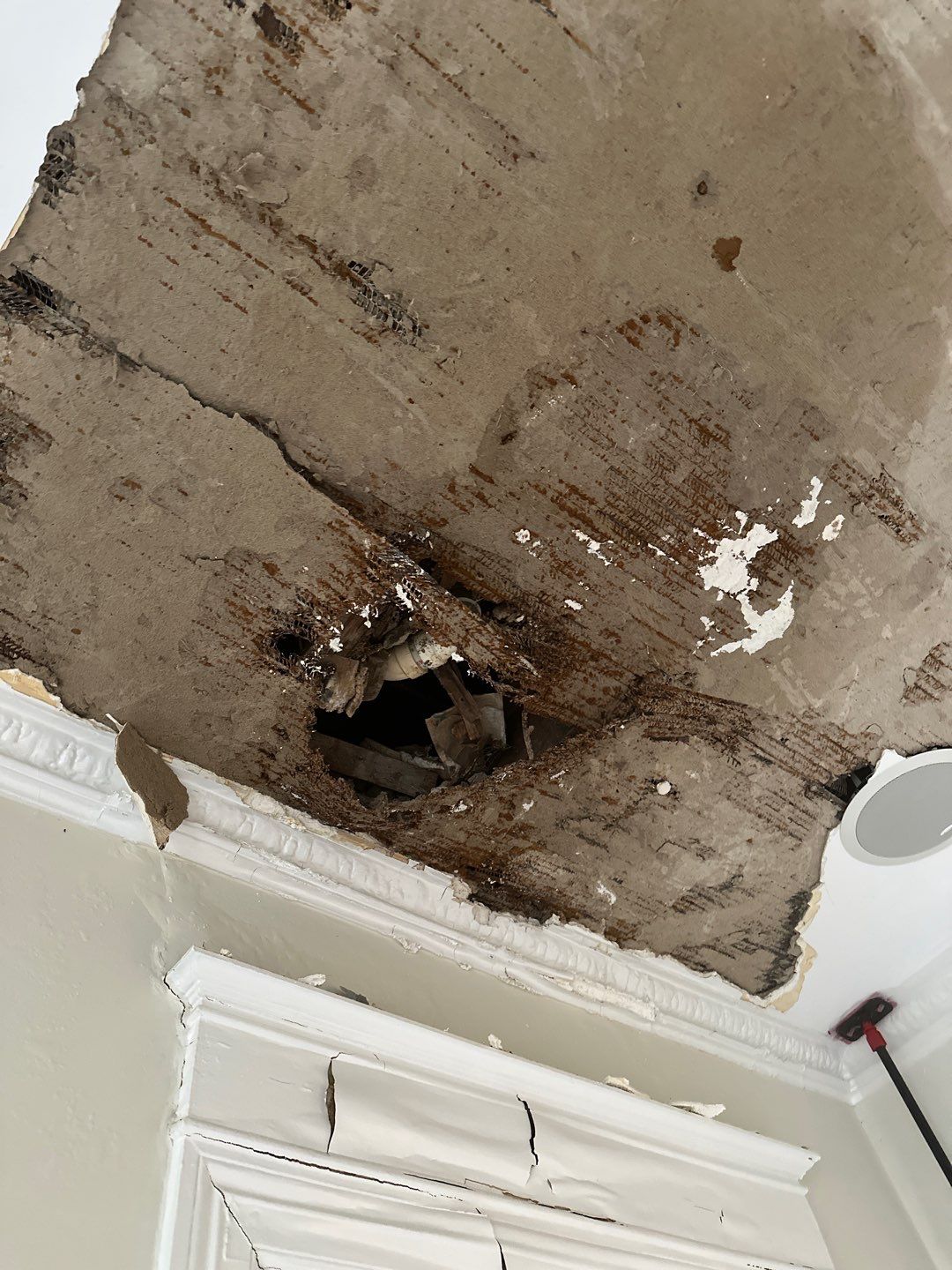 Continued moisture removal and air circulation during mid-stage drying of water-damaged structure.