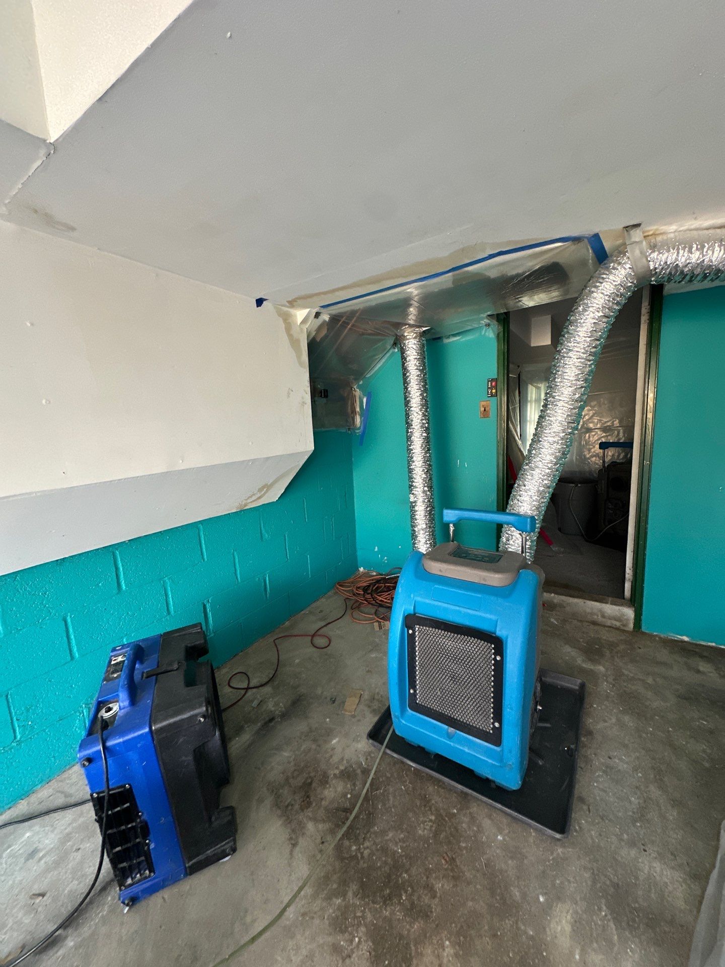 Structural drying complete, remediation site ready for wall replacement and rebuild.