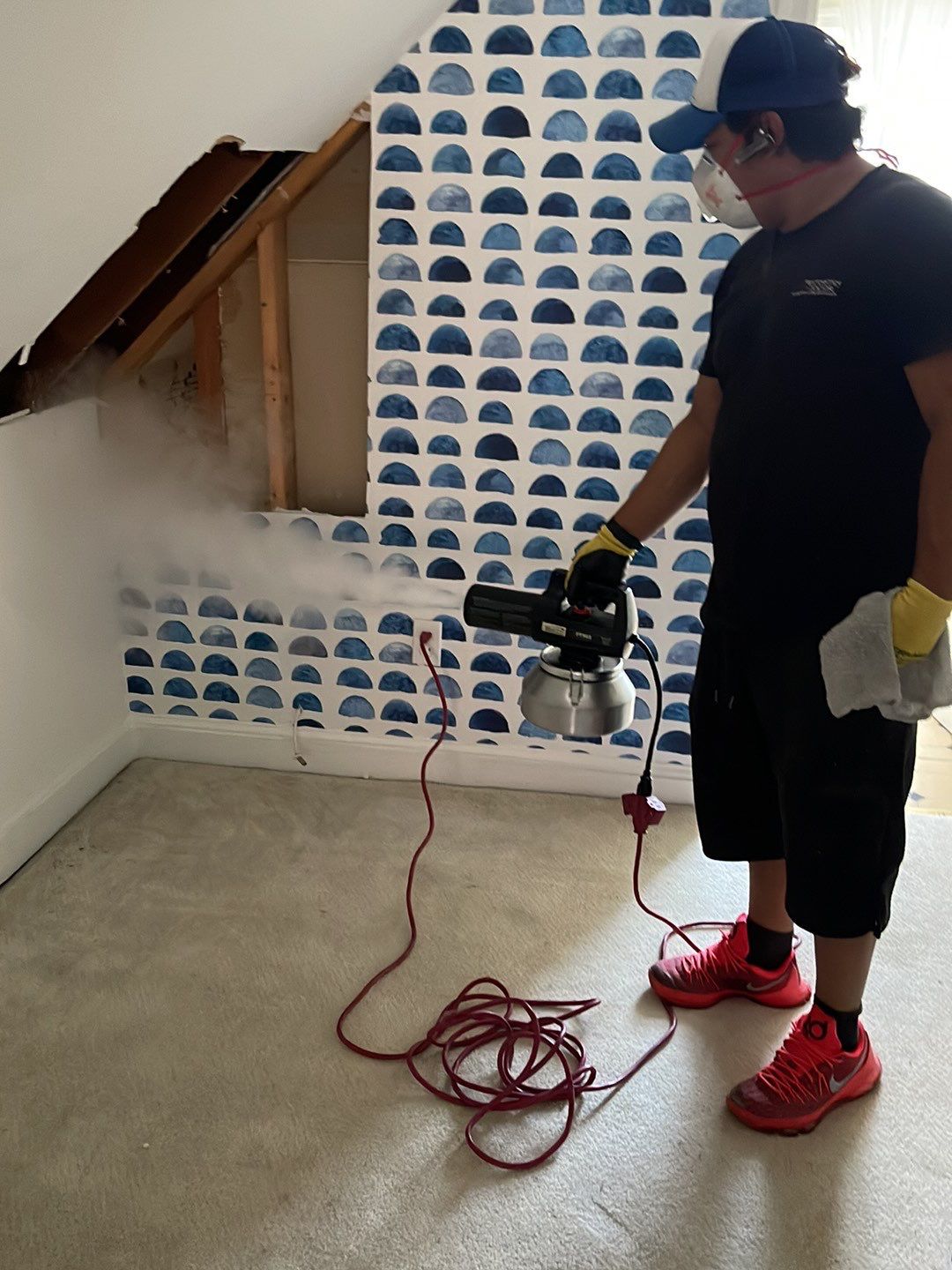 Mid-stage drying setup showing equipment placement and moisture control during active water damage restoration work.