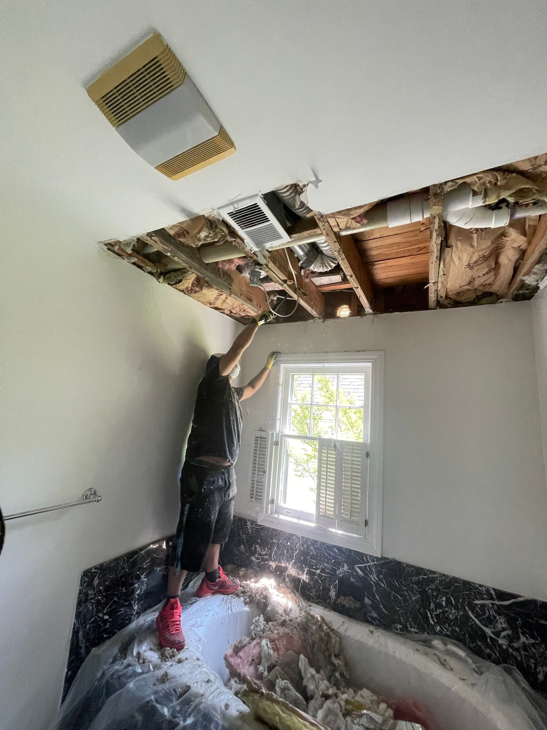 Final-stage water damage restoration in Washington, with equipment removal and structural surfaces dried to normal moisture levels.