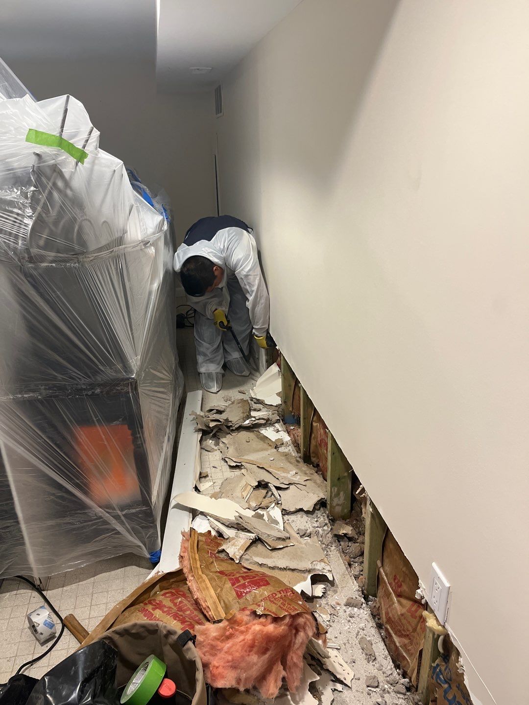 Continued monitoring and equipment adjustment during structural drying to ensure complete moisture removal from materials.