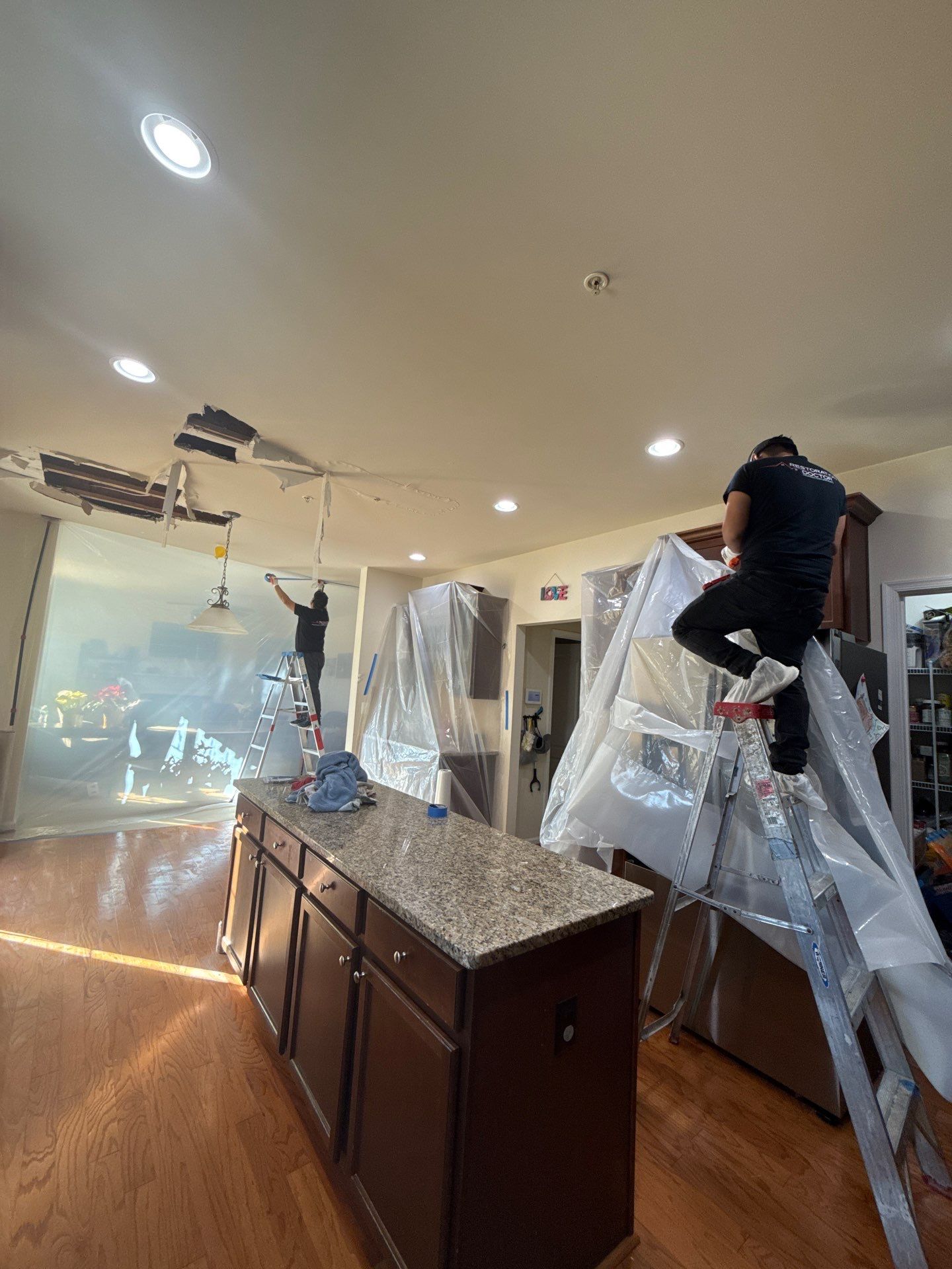 Containment and air handling during active mold remediation work.