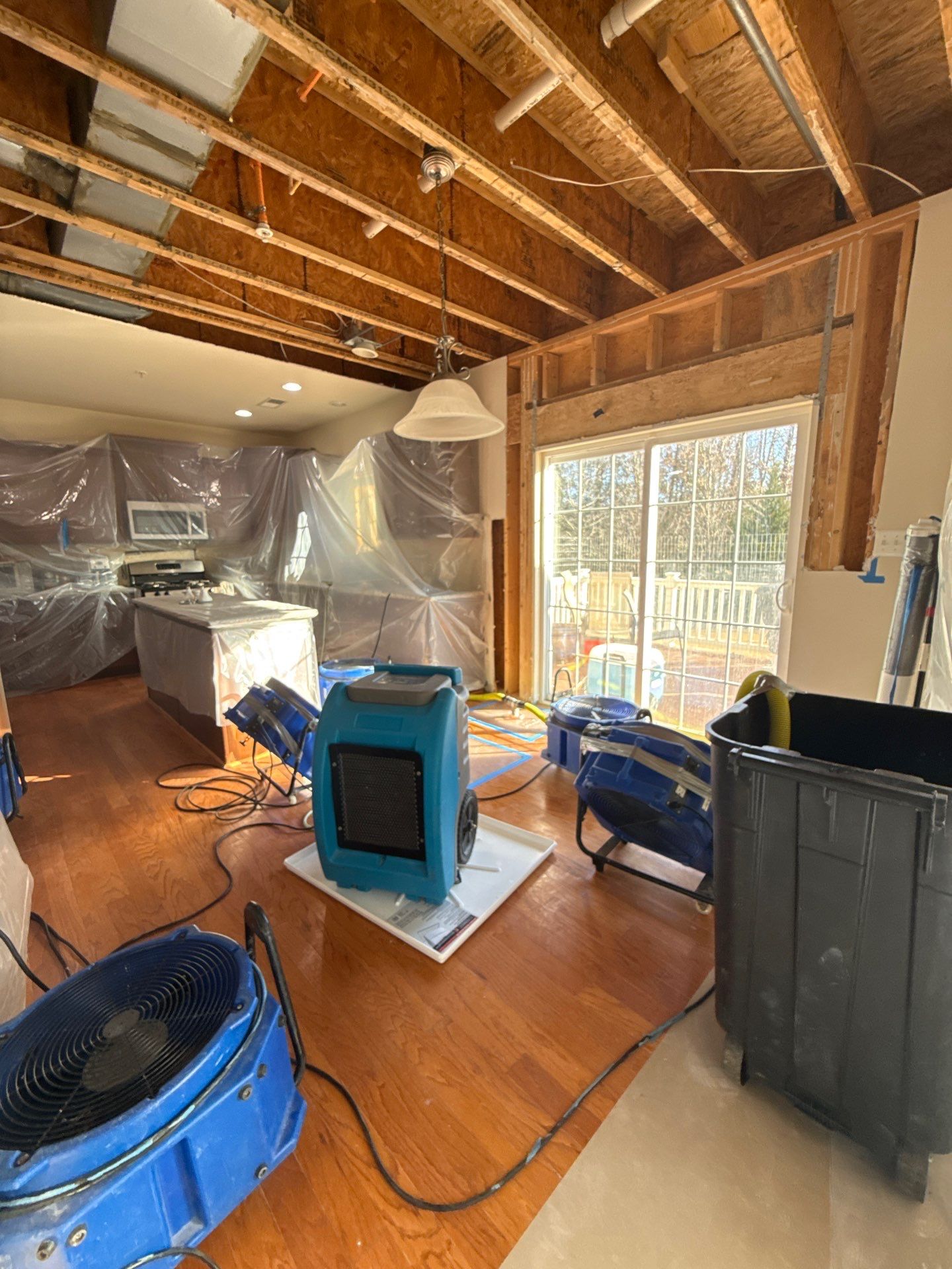 Final drying phase with equipment staged for removal.