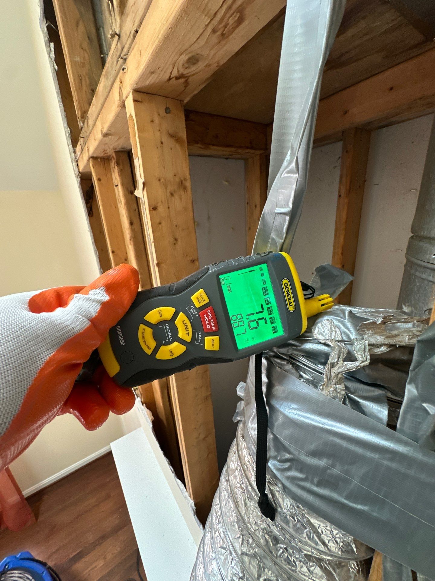 Structural framing and substrate prepared for replacement following mold remediation in Fort Washington home.
