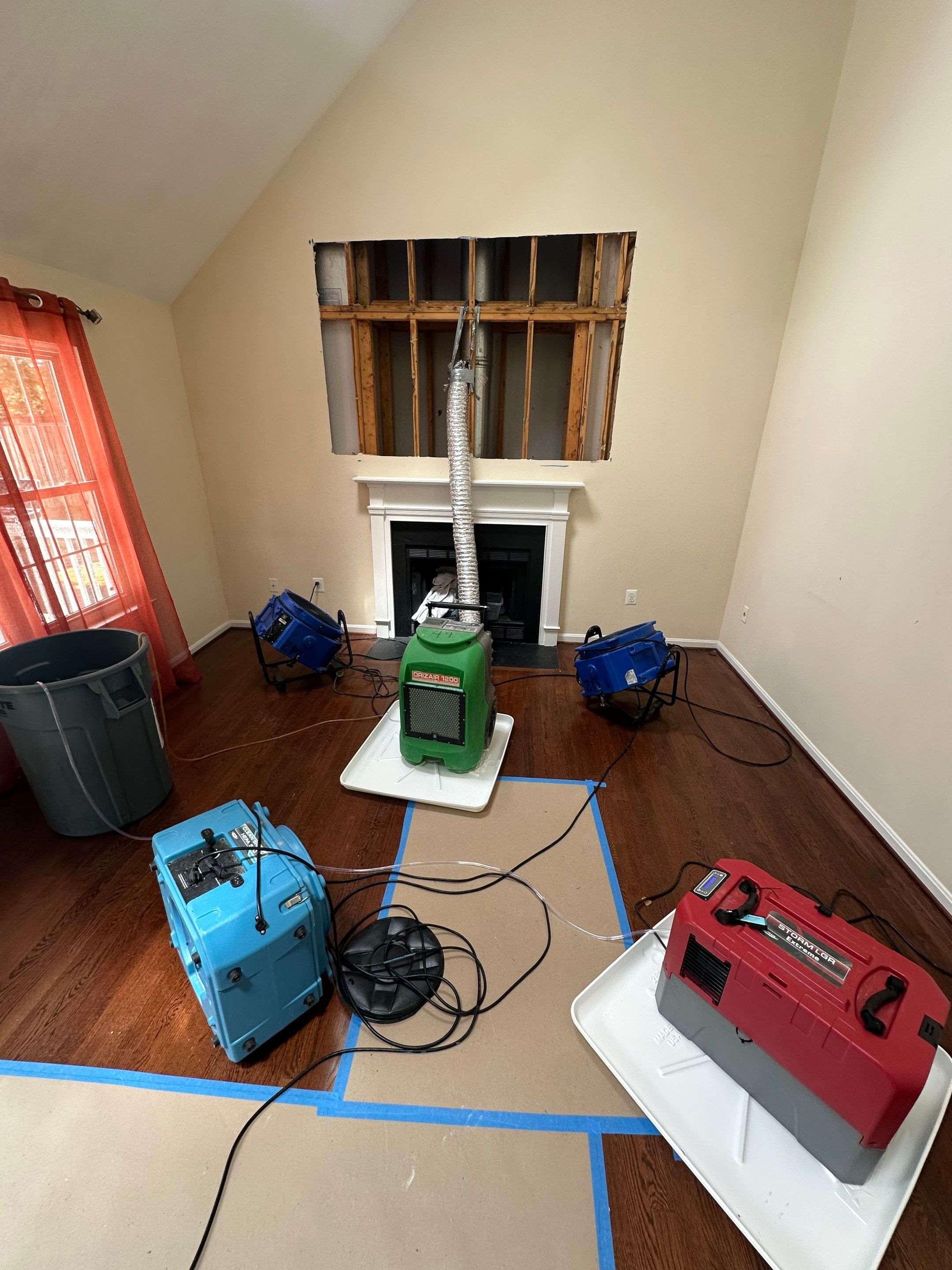 New drywall and framing installed after mold remediation wall replacement work completed.