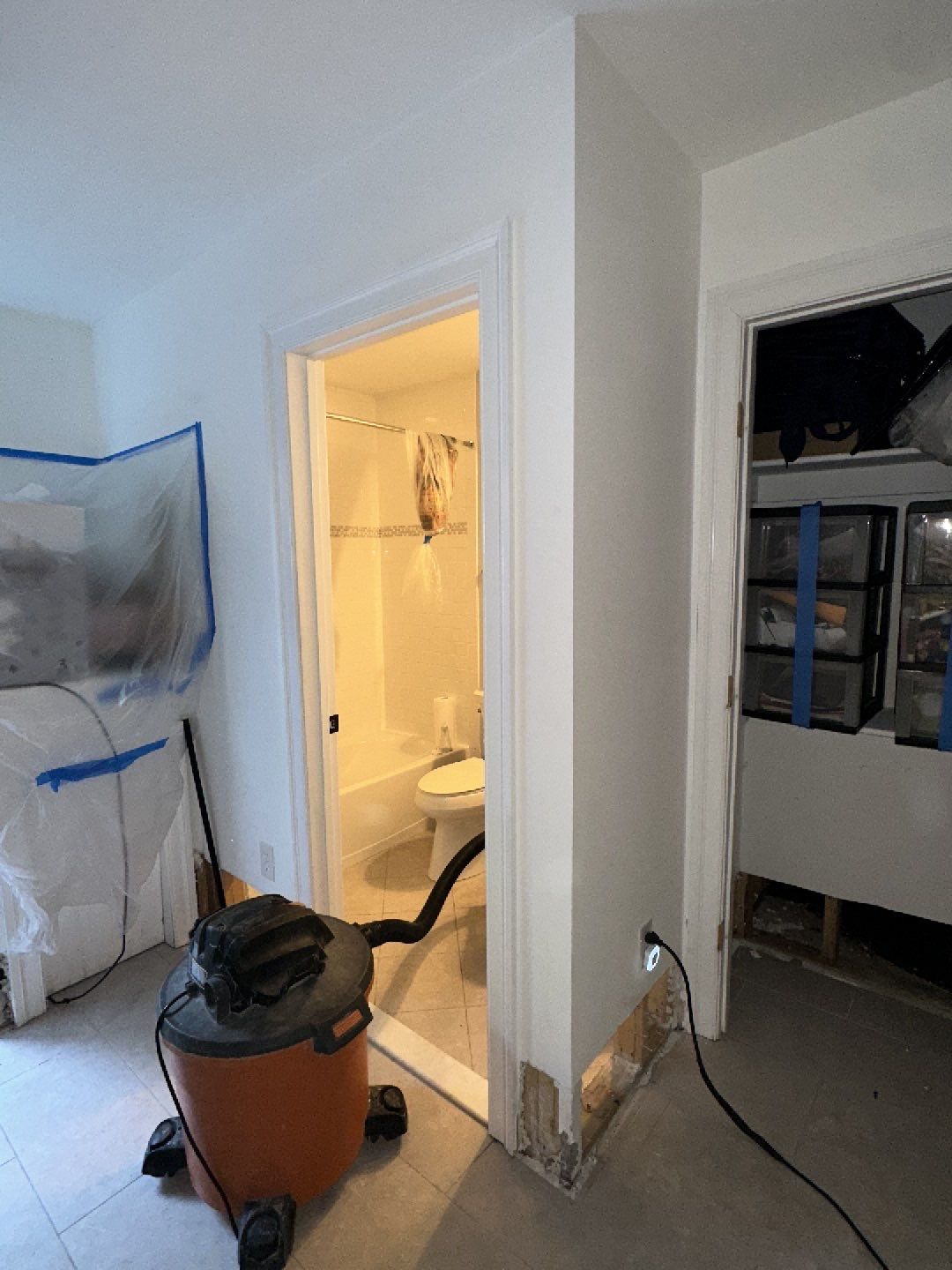 Dehumidification and air circulation equipment drying the restoration area.