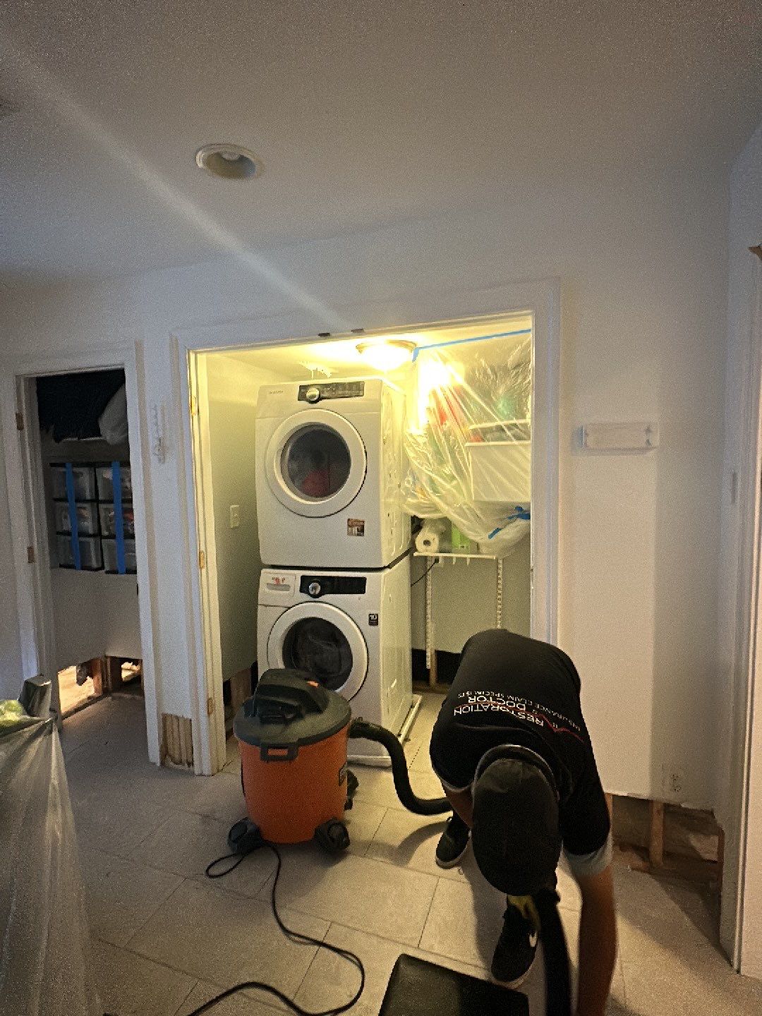 Wet materials and flooring removal as part of water damage mitigation work.