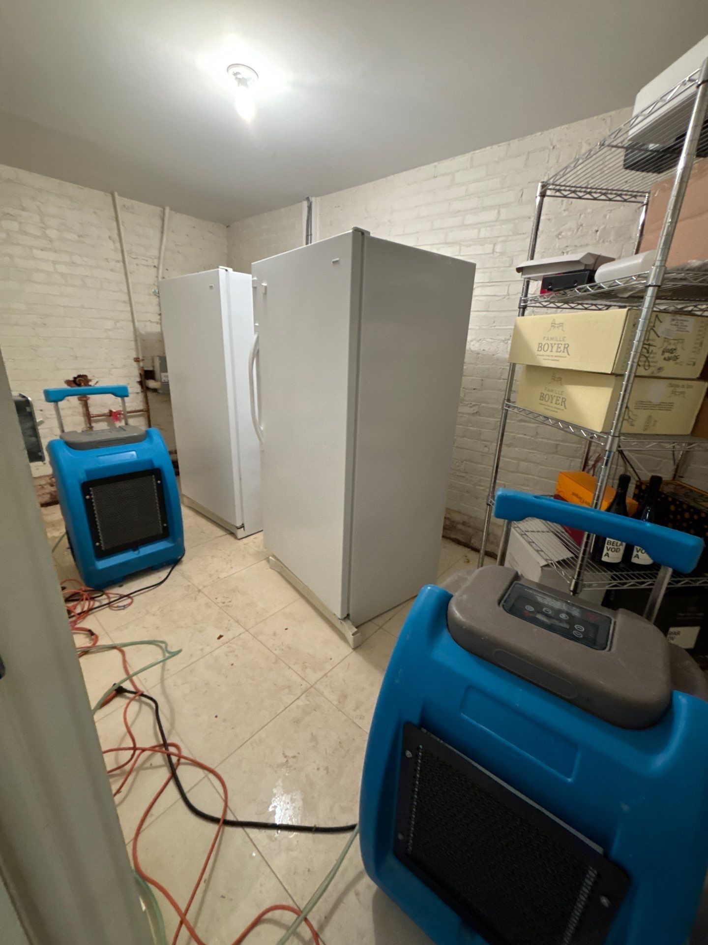 Final-stage water damage restoration in Washington with equipment removal and structural materials returned to normal moisture levels.