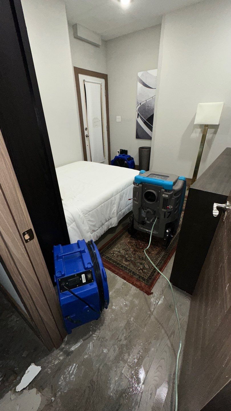 Dehumidification equipment positioned to manage moisture levels throughout the drying phase of water damage restoration.