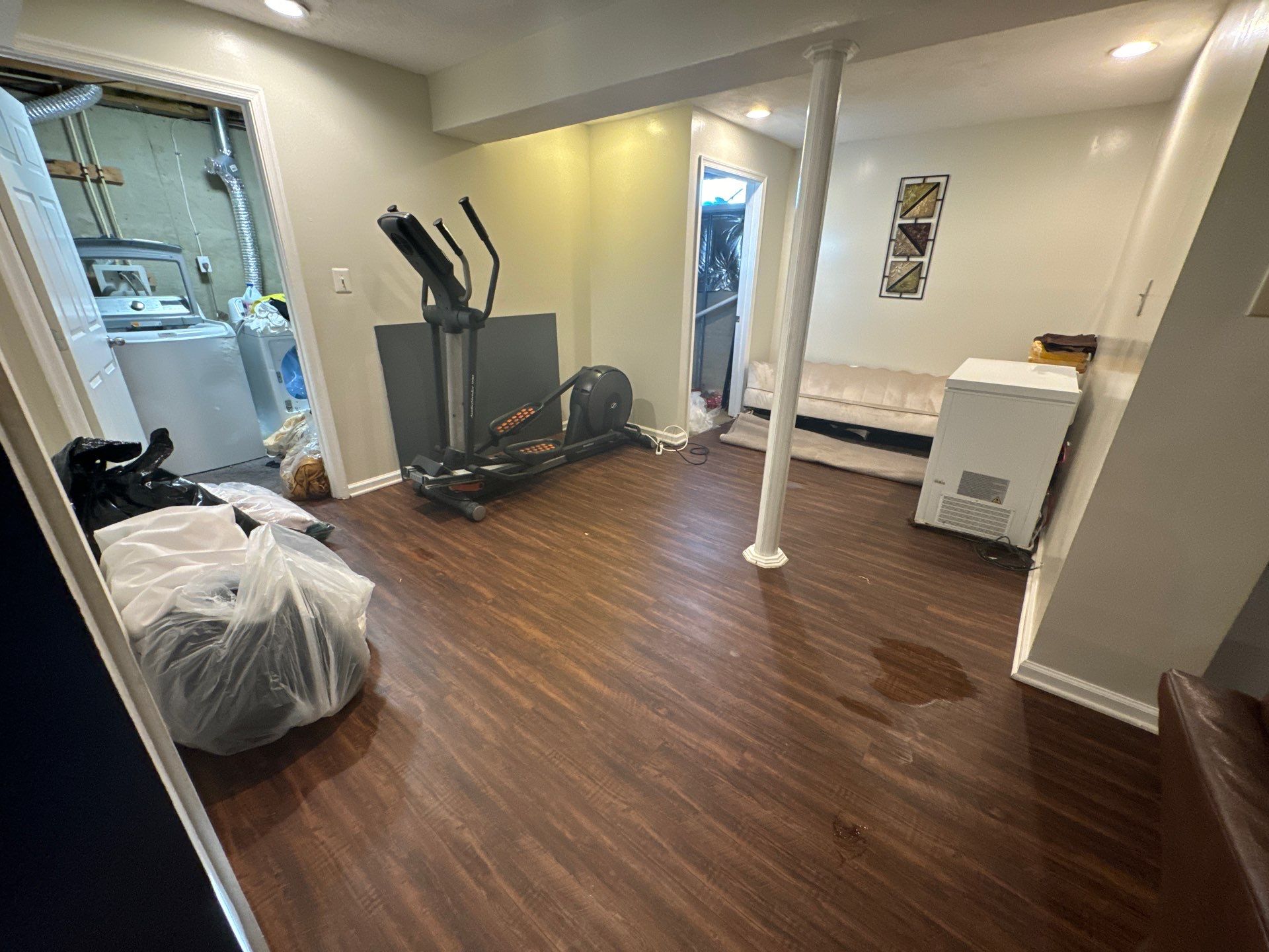 Wet carpet and padding removal as part of water damage remediation process.