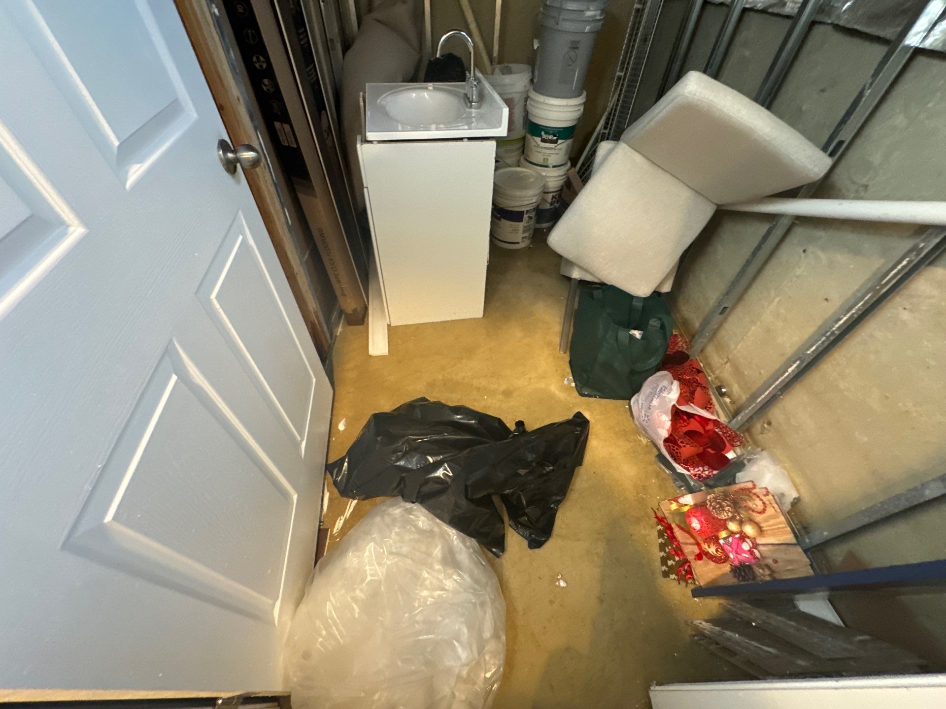 Standing water being extracted from flooring during water damage restoration in Marlboro.