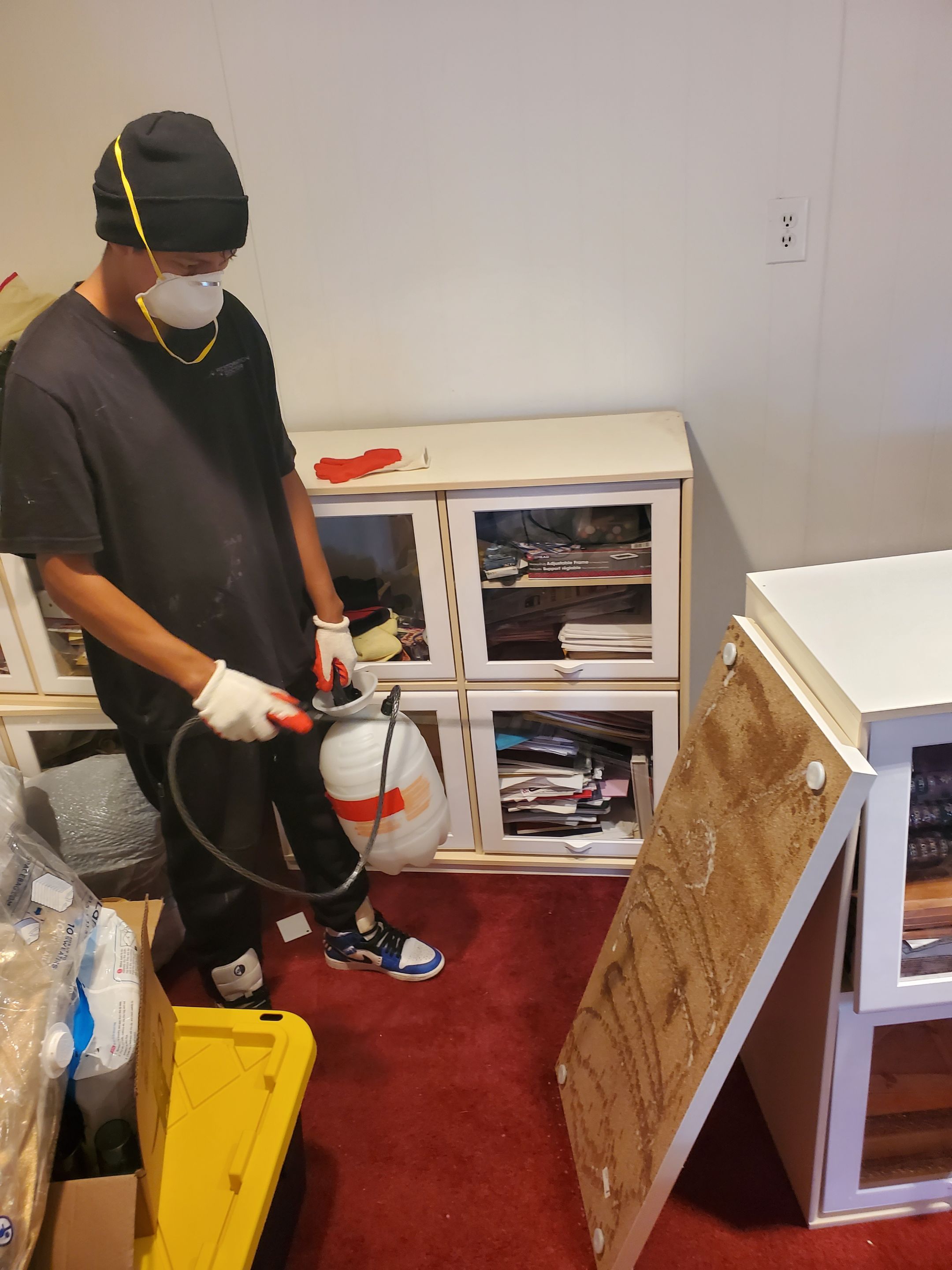 Dehumidification equipment positioned for structural drying after water extraction.