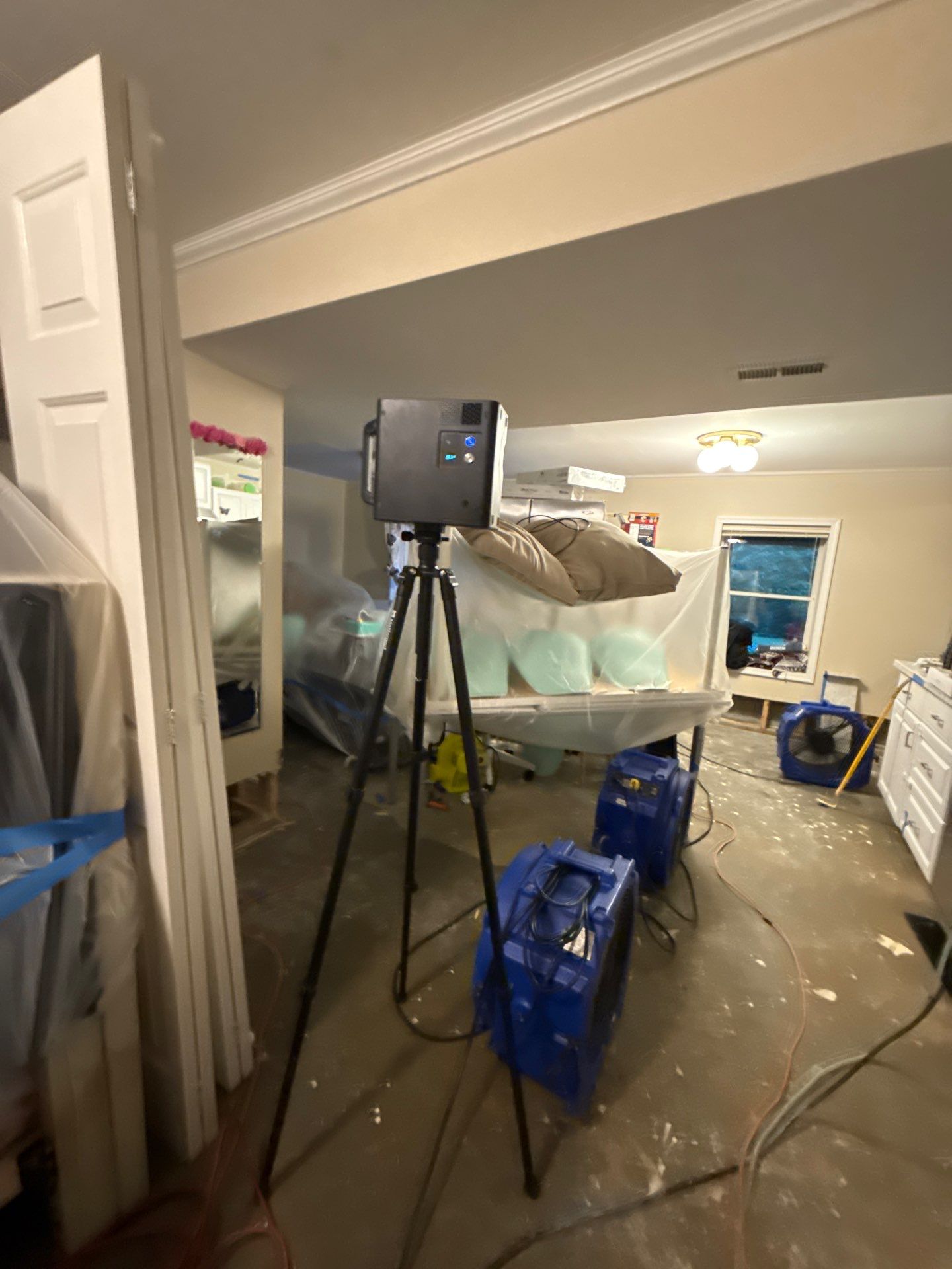 Wet carpet and flooring removal in progress at Potomac water damage restoration site.