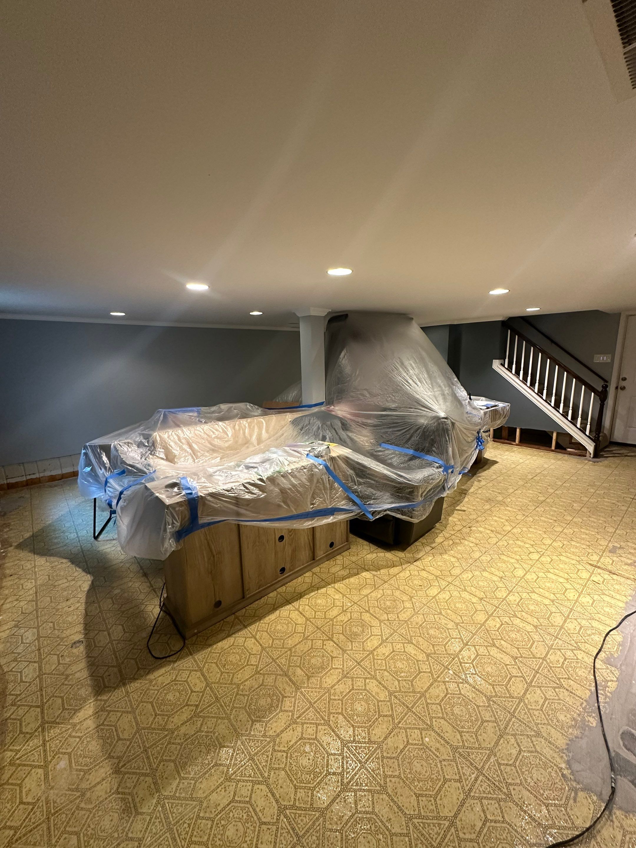 Containment barrier and negative air setup during mold remediation work in Kensington.