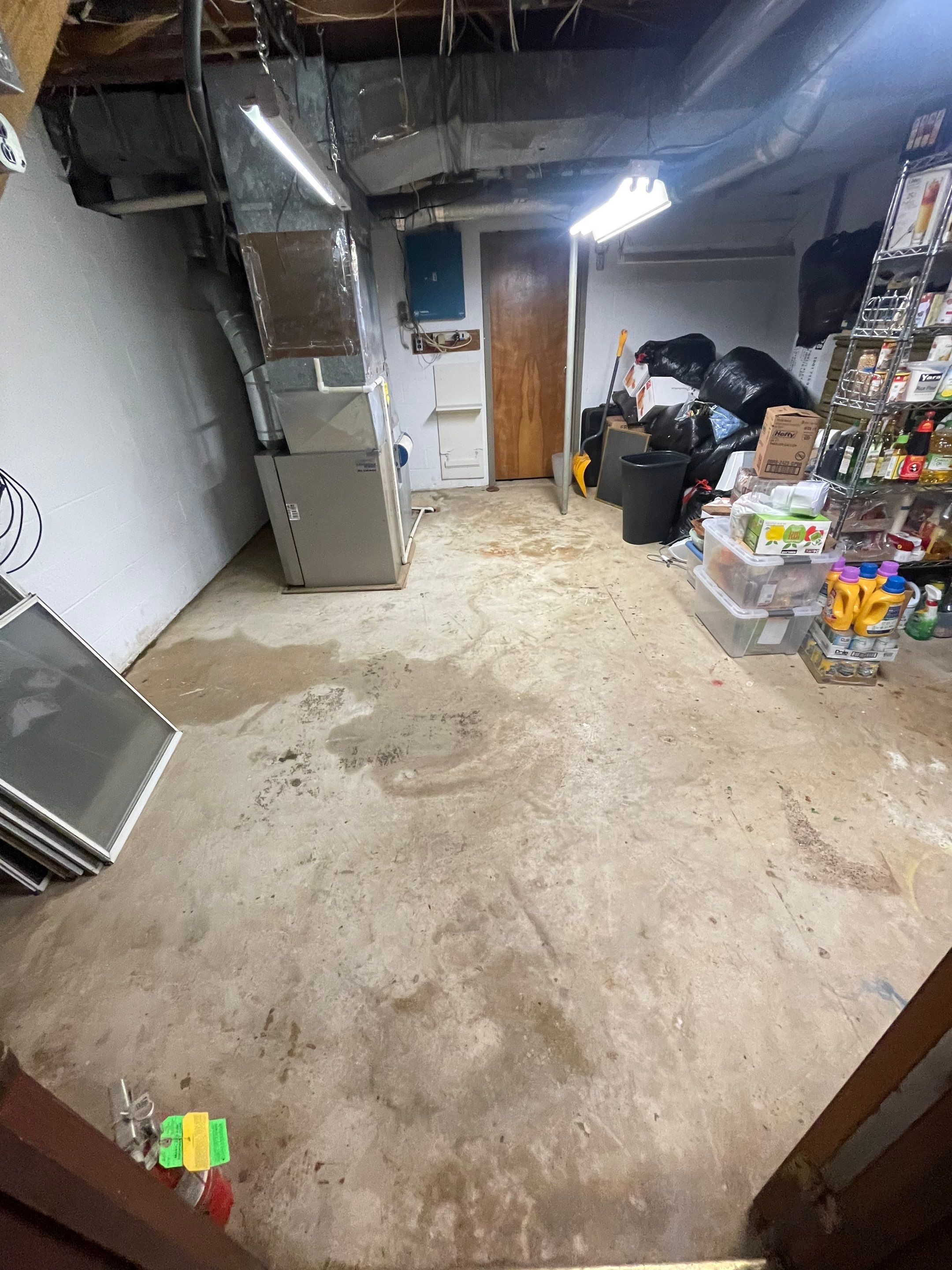 Final-stage structural drying complete, equipment removal and site restoration following Kensington water damage mitigation.