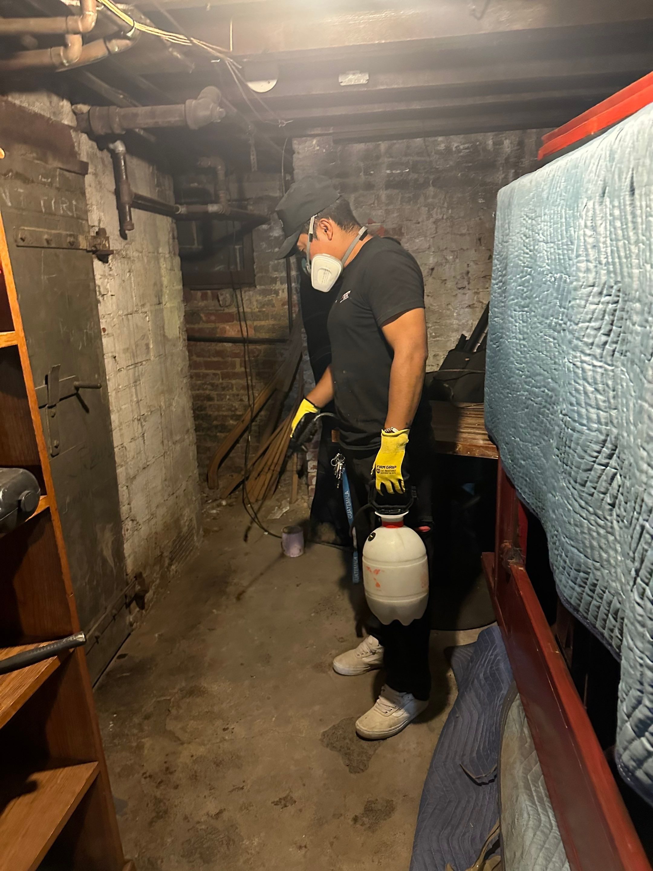 Standing water extraction underway during water damage restoration in Washington.