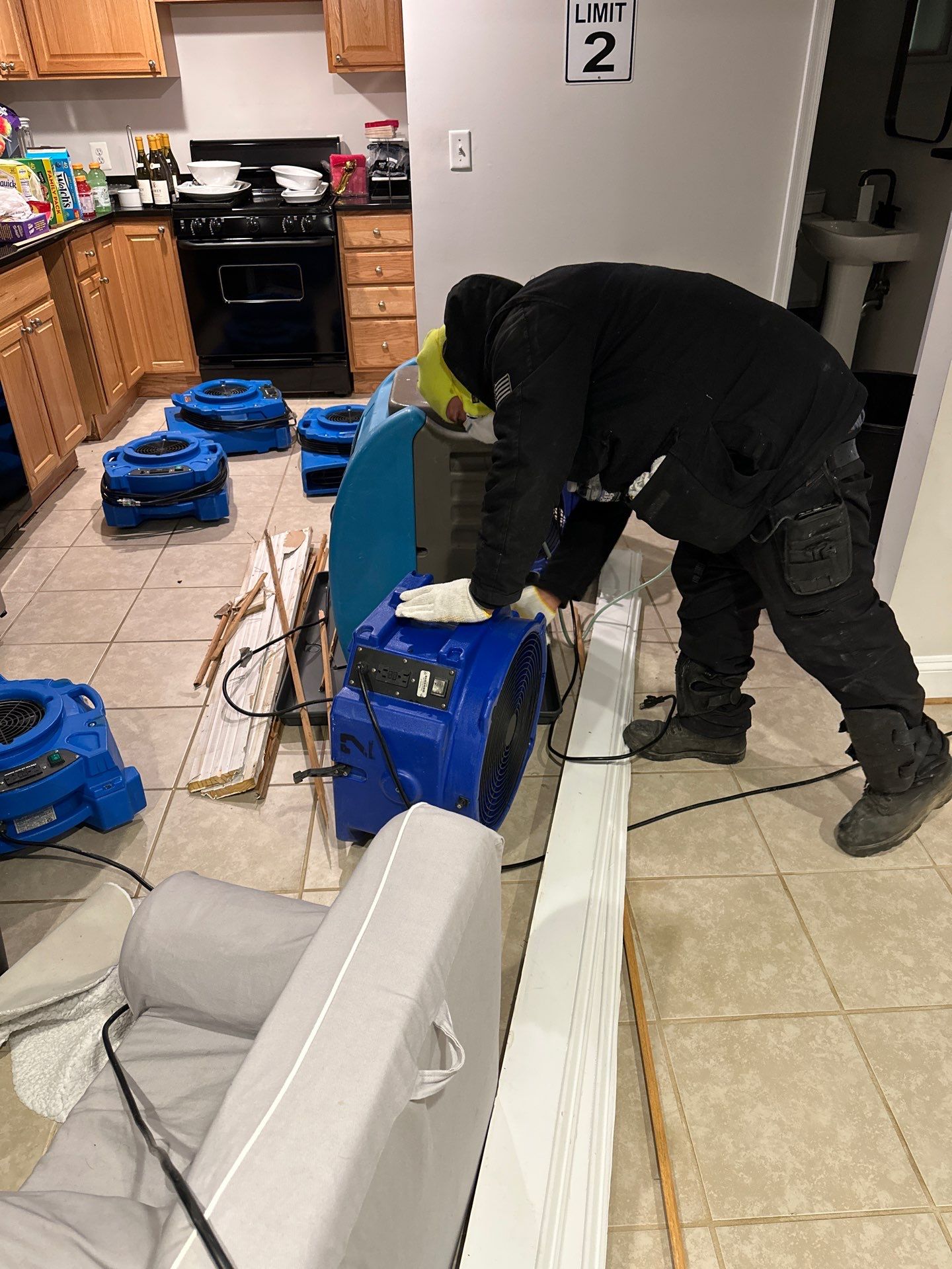 Drying equipment monitoring moisture levels as structural materials continue the restoration process.